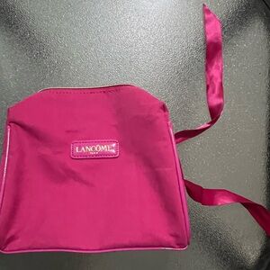 Pink Lancôme Paris makeup bag